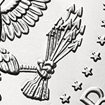 close up of arrows on the kennedy half dollar reverse