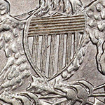 close up of the shield on the capped bust dime reverse